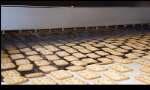 Pulverización de aceite sobre galletas sin aire